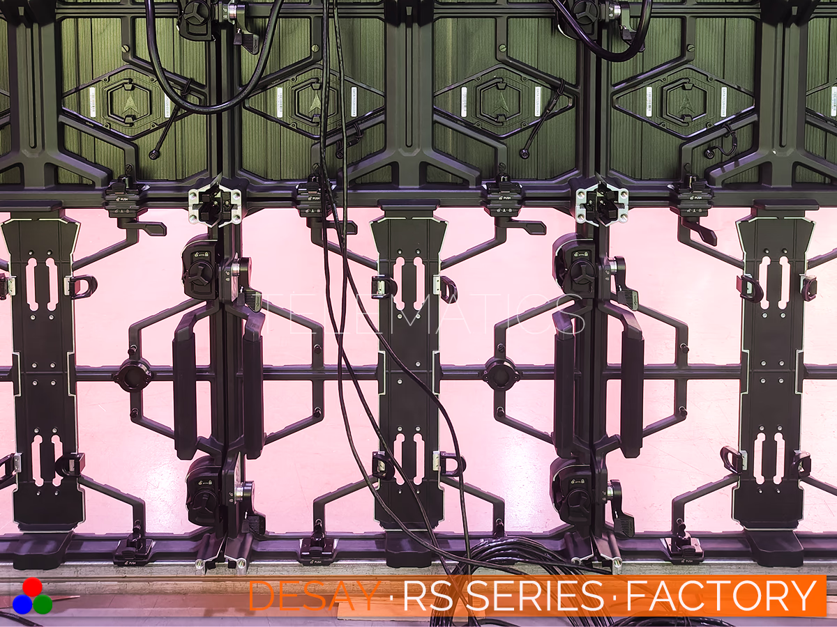 The Art Of LED · Desay RS Series · Telematics Canada Rear structural view of multiple RS Series cabinets connected in the factory, highlighting the clean cable management and robust module locking systems prior to signal activation.
