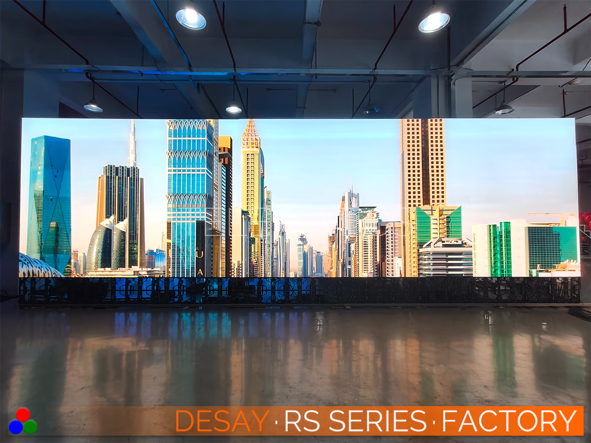 The Art Of LED · Desay RS Series · Telematics Canada Bright city skyline displayed on a flat Desay RS Series video wall, demonstrating high dynamic range and clear image definition for corporate and outdoor event applications.