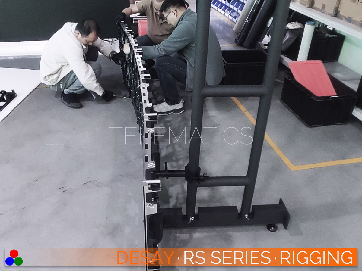 The Art Of LED · Desay RS Series · Telematics Canada Installation technicians assembling a curved ground support system for the Desay RS Series, preparing the NovaStar-equipped video wall for rapid event deployment.